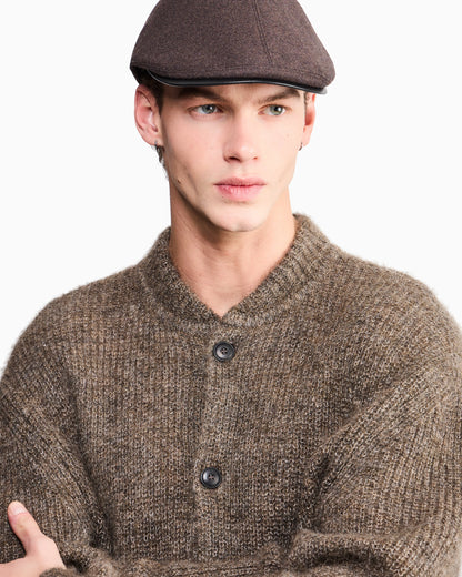 Flat cap in wool and cashmere with leather details