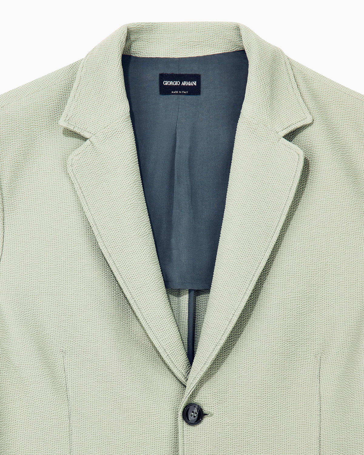 Single-breasted jacket in technical seersucker jersey with patch pockets
