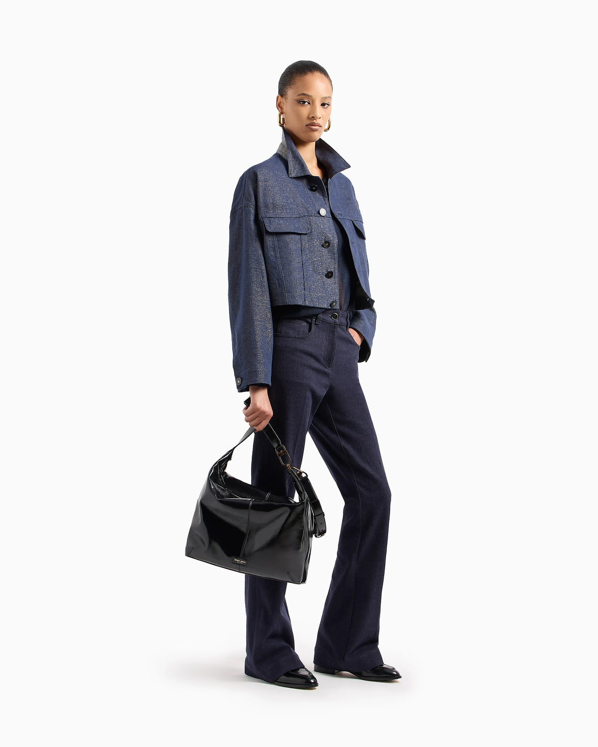 Denim trousers with high waist and flared hem