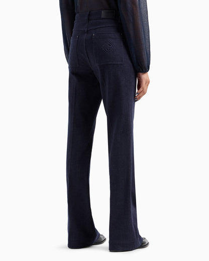 Denim trousers with high waist and flared hem