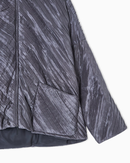 Diagonal pleated silk pea coat