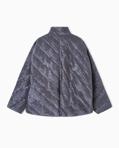 Diagonal pleated silk pea coat