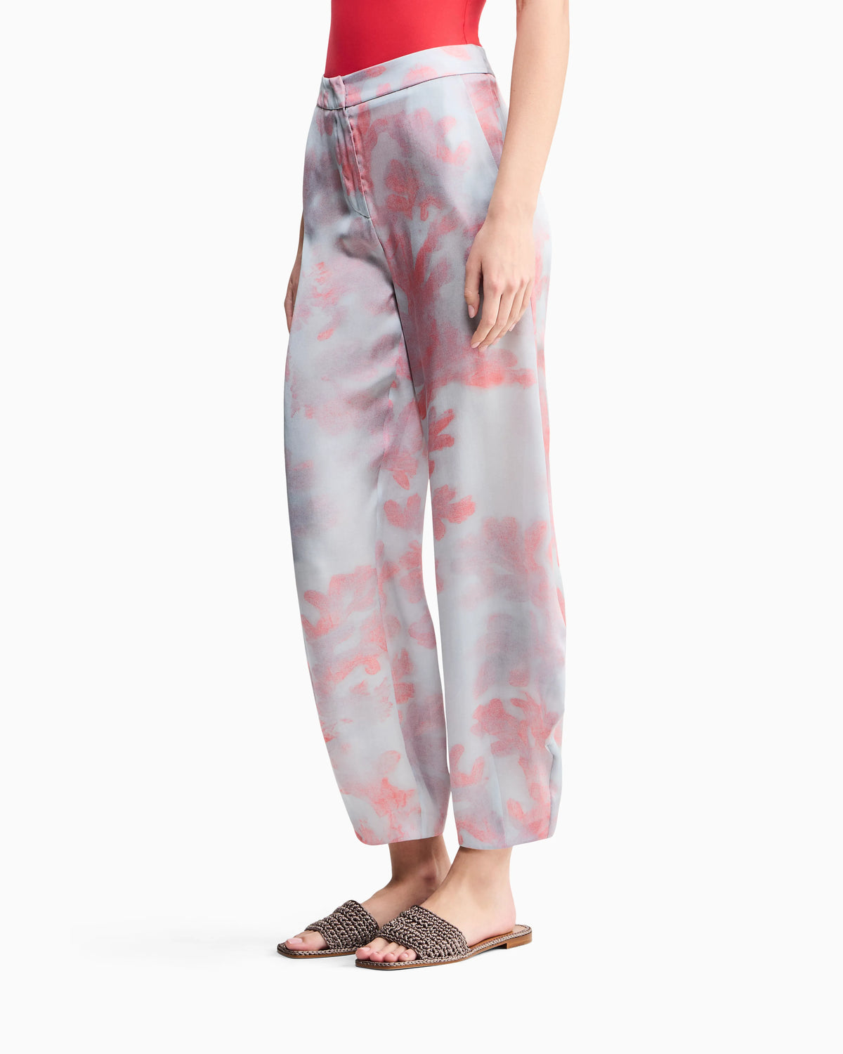 Rounded hem trousers in coral print silk
