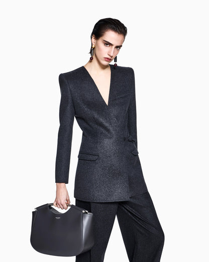 Blazer in wool flannel with side knot closure