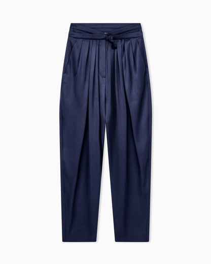 Multi-pleated trousers in silk satin with a waistband knot