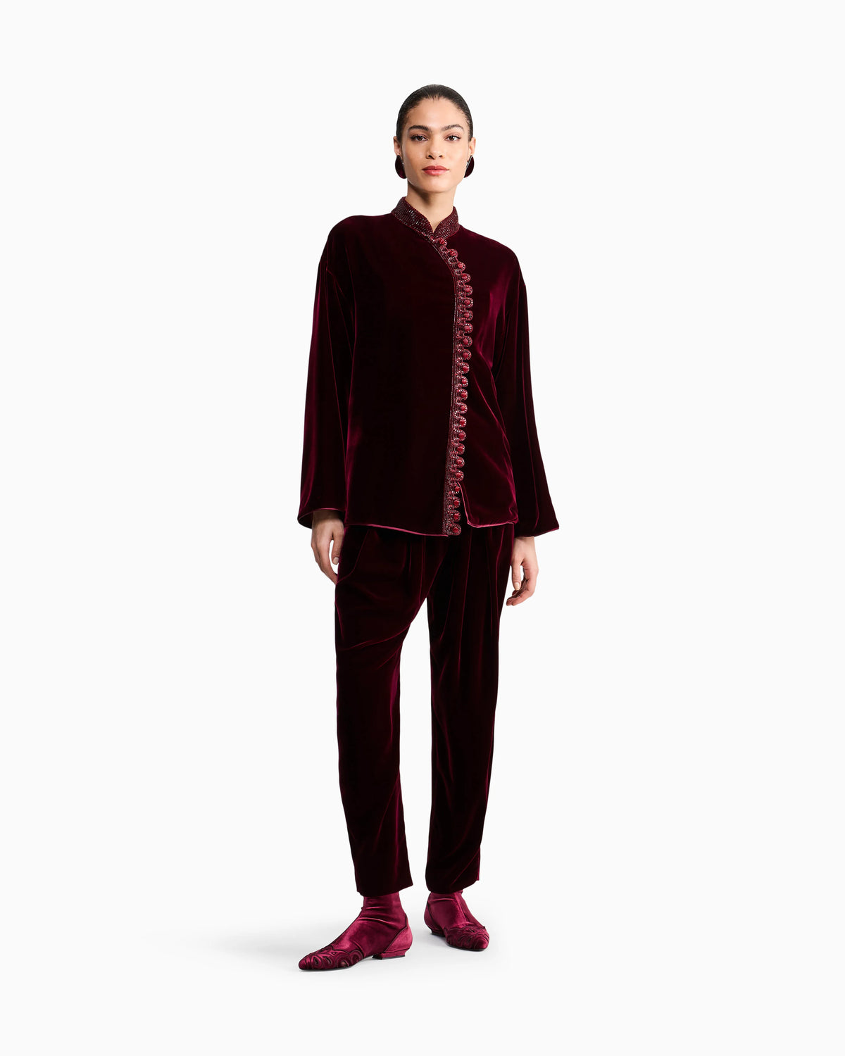 Pleated trousers in silk velvet with waistband knot detail