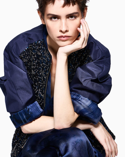 Multi-pleated trousers in printed silk charmeuse with knot