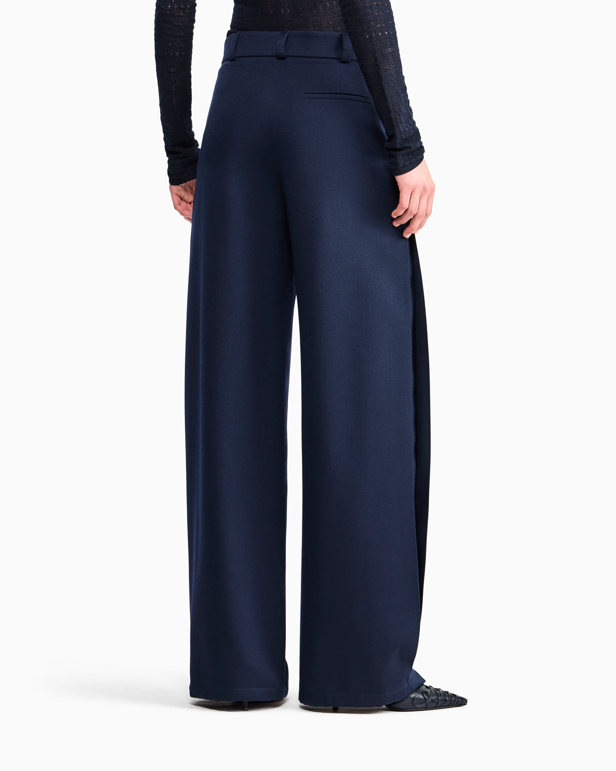 Flat front tuxedo wool trousers with a hidden side pleat