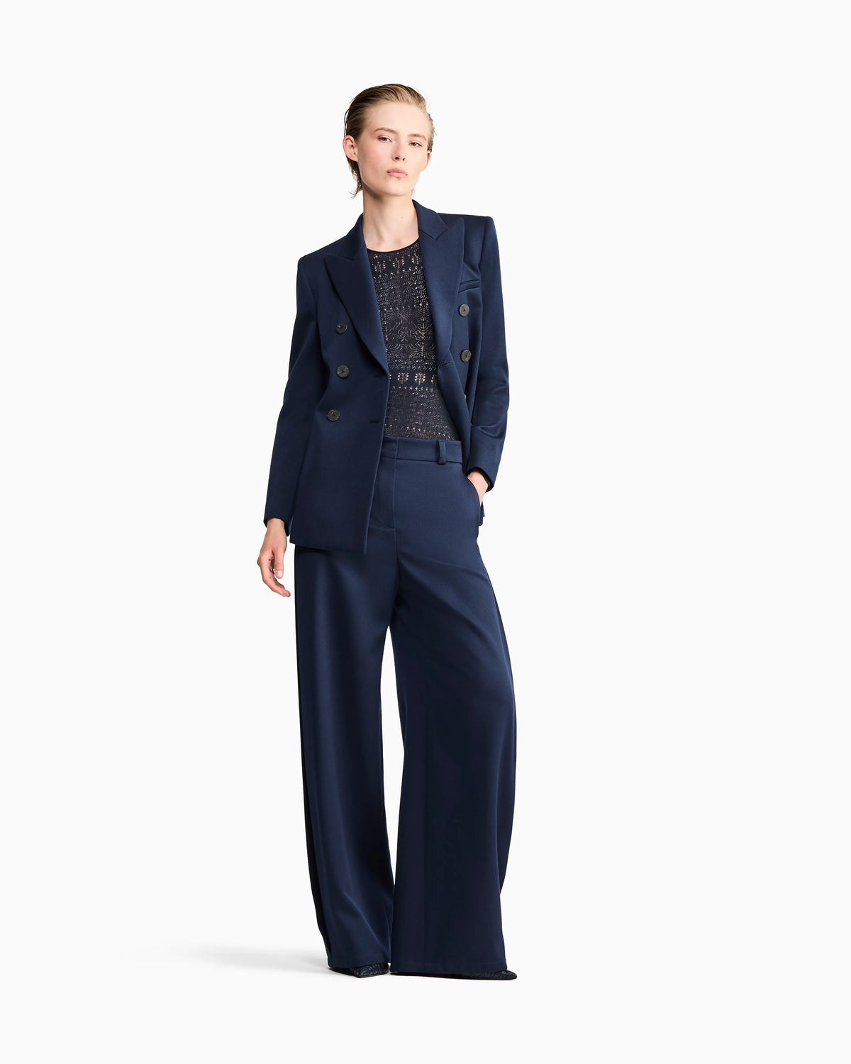 Flat front tuxedo wool trousers with a hidden side pleat