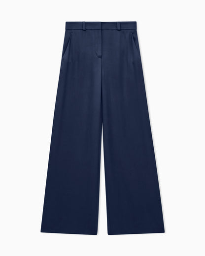 Flat front tuxedo wool trousers with a hidden side pleat