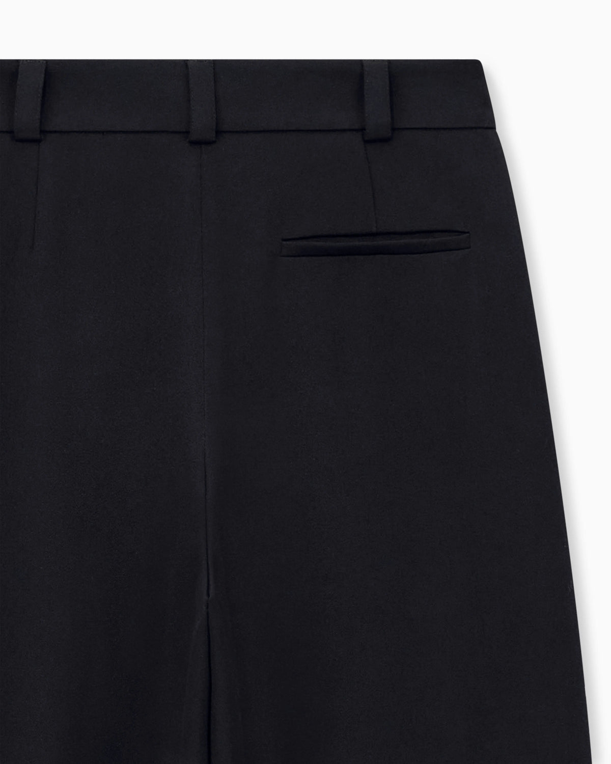 Flat front tuxedo wool trousers with a hidden side pleat
