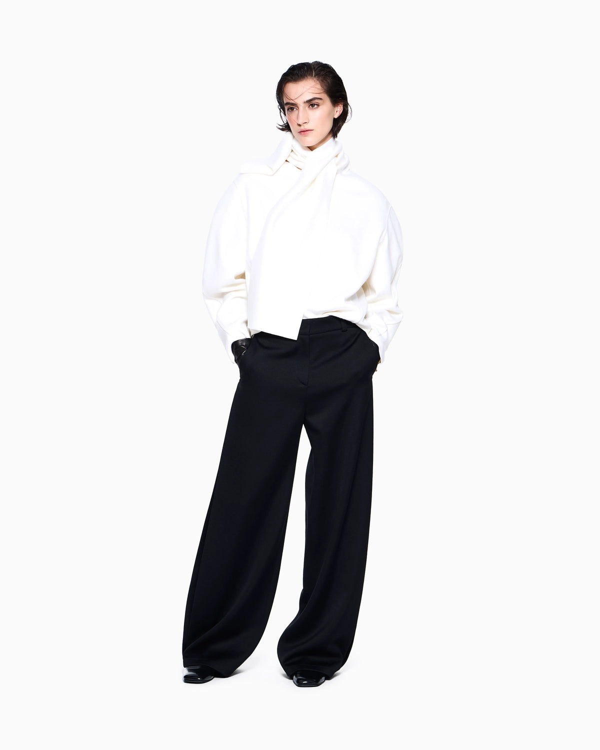 Flat front tuxedo wool trousers with a hidden side pleat