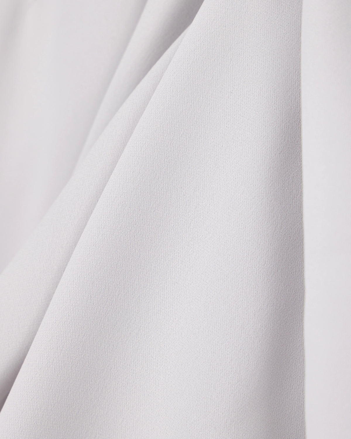 One-shoulder shirt in silk triple georgette with a sash