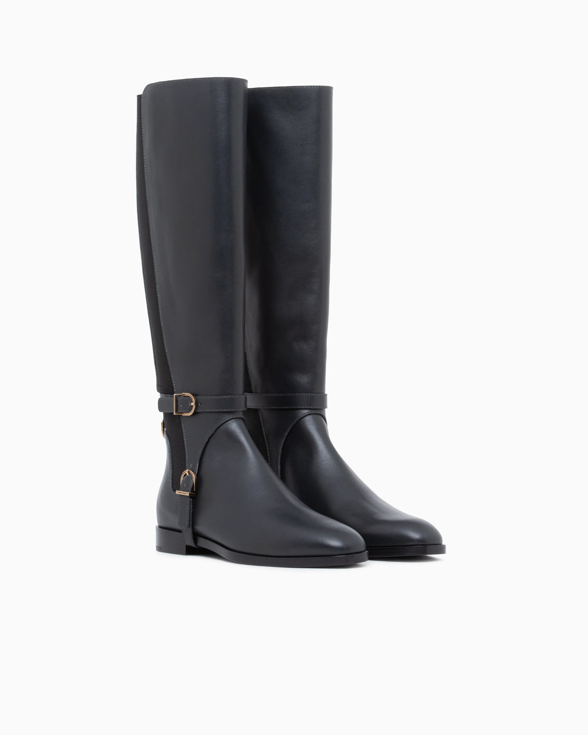 Boots in leather with rubber details