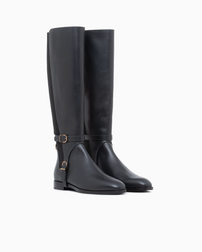 Boots in leather with rubber details