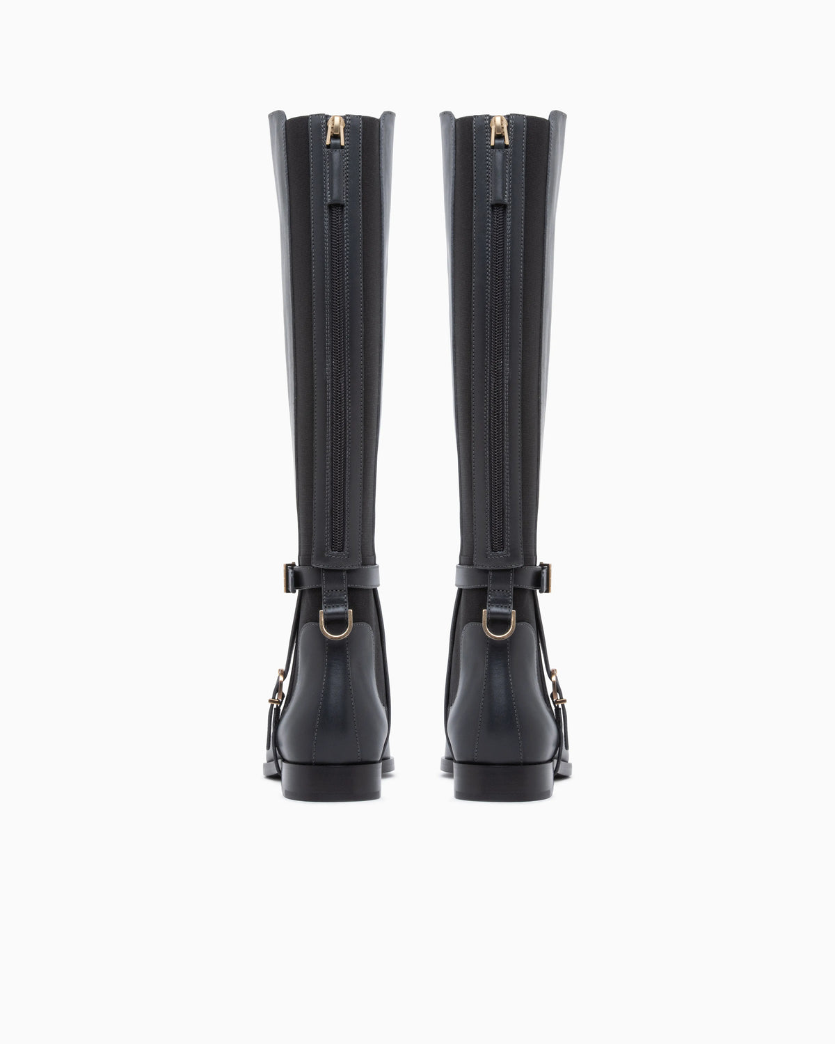 Boots in leather with rubber details