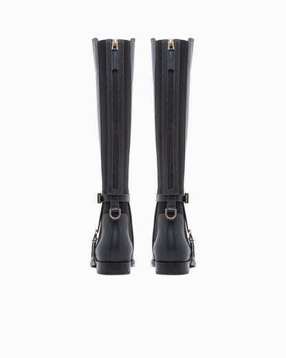 Boots in leather with rubber details