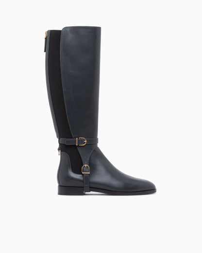 Boots in leather with rubber details