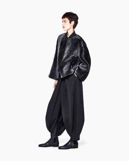 Boots in leather with rubber details