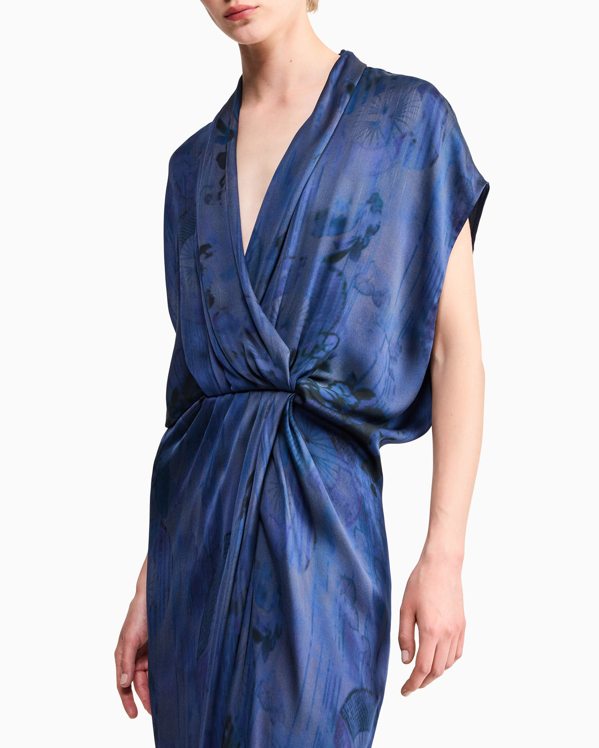 Draped silk dress with deep neckline and batik flower print