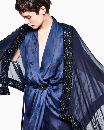 Draped silk dress with deep neckline and batik flower print