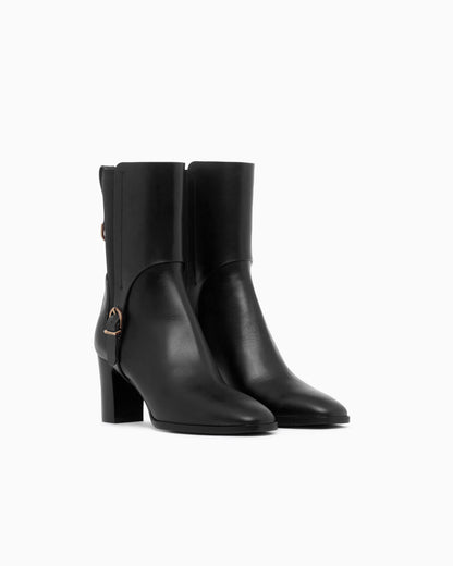 Boot with rubber details and leather sole