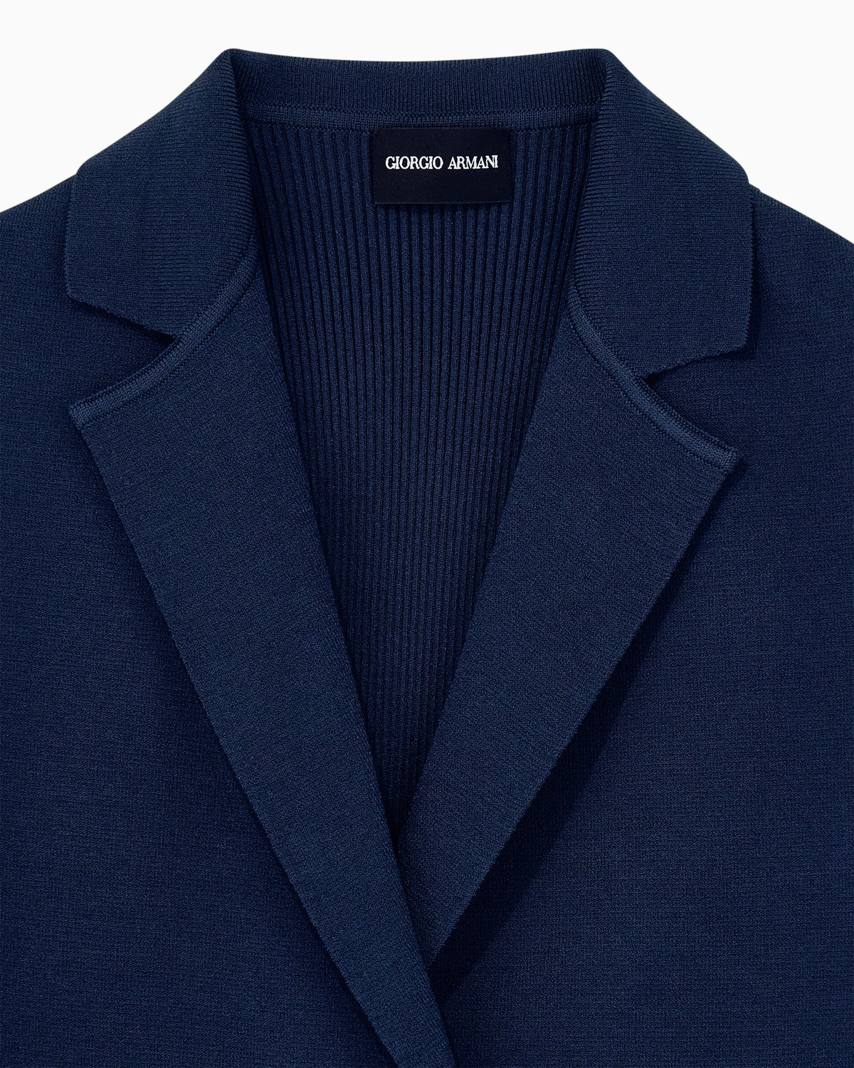 Viscose knit vest with ribbed texture and lapel