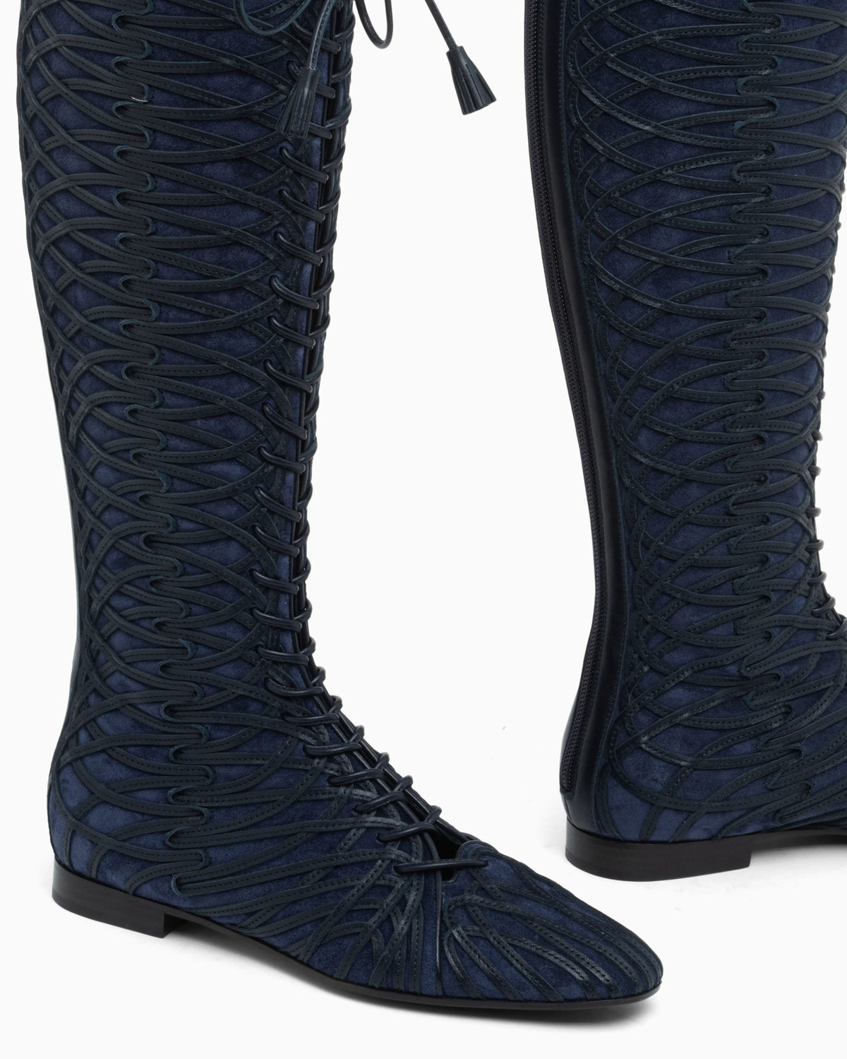 Boots in split leather with a leather sole