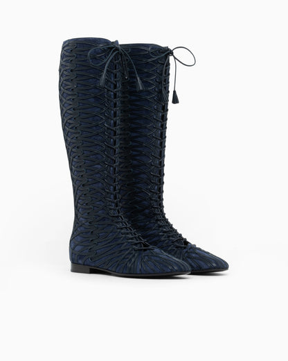 Boots in split leather with a leather sole