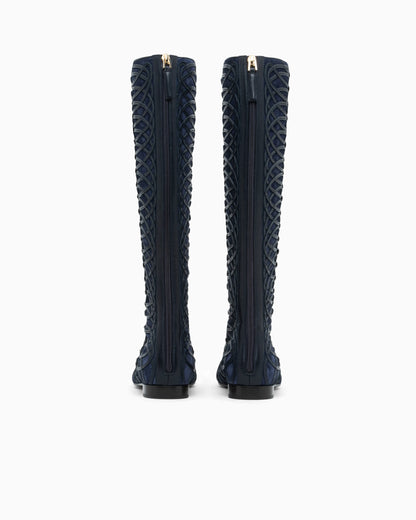 Boots in split leather with a leather sole