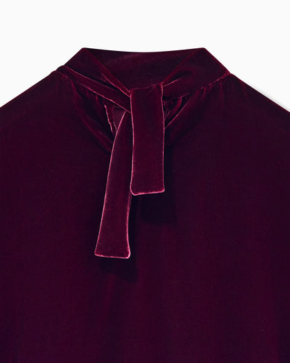Blouse in velvet with stand-up collar and ribbons