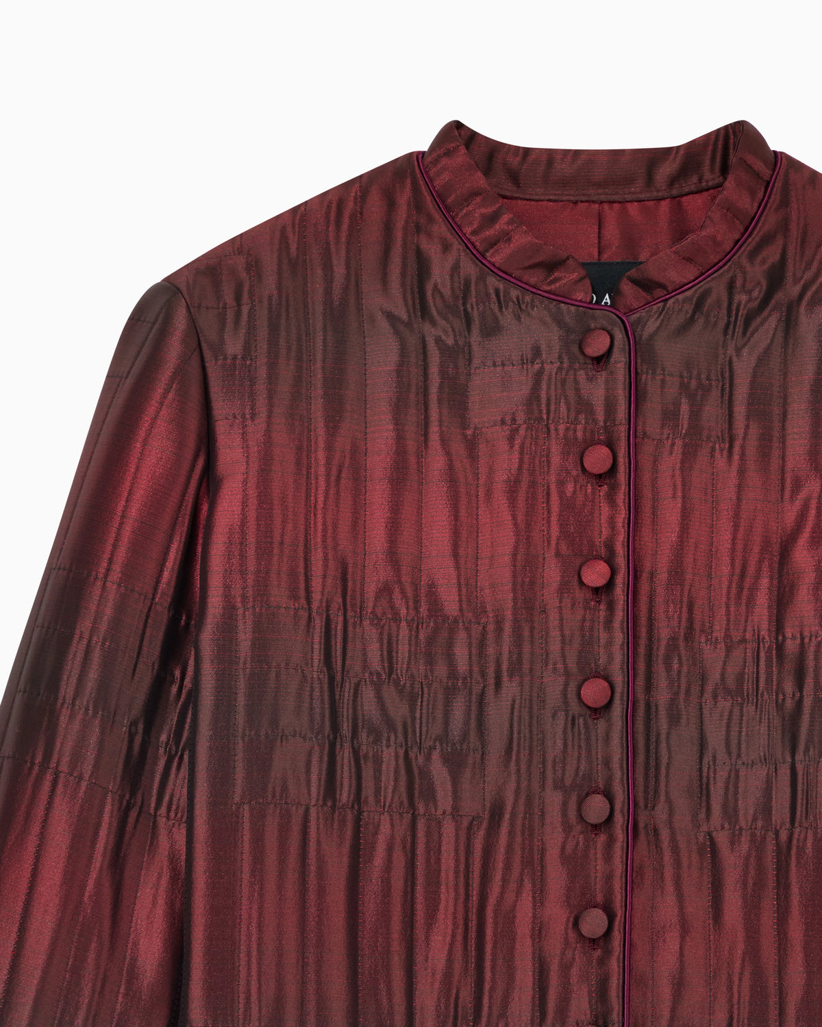 Quilted jacket with mandarin collar and covered buttons