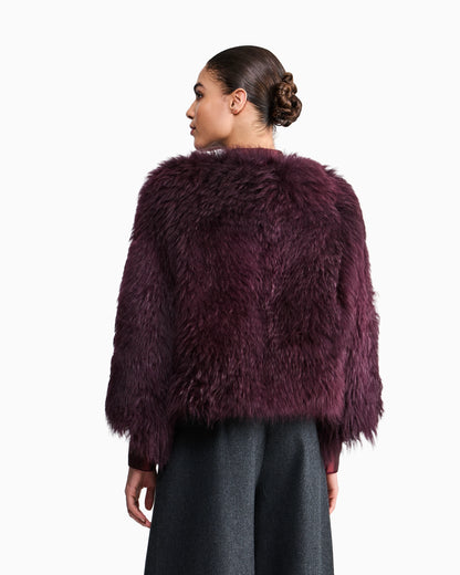 Long-haired leather jacket with tassels and silk lining