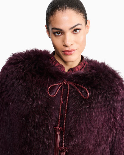Long-haired leather jacket with tassels and silk lining