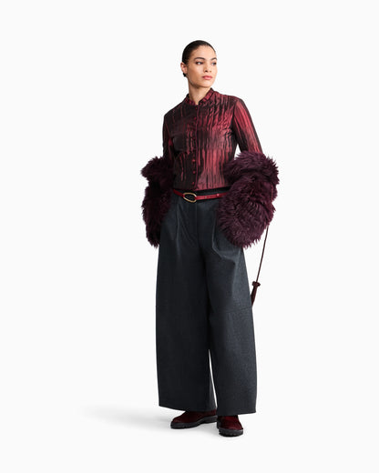 Long-haired leather jacket with tassels and silk lining