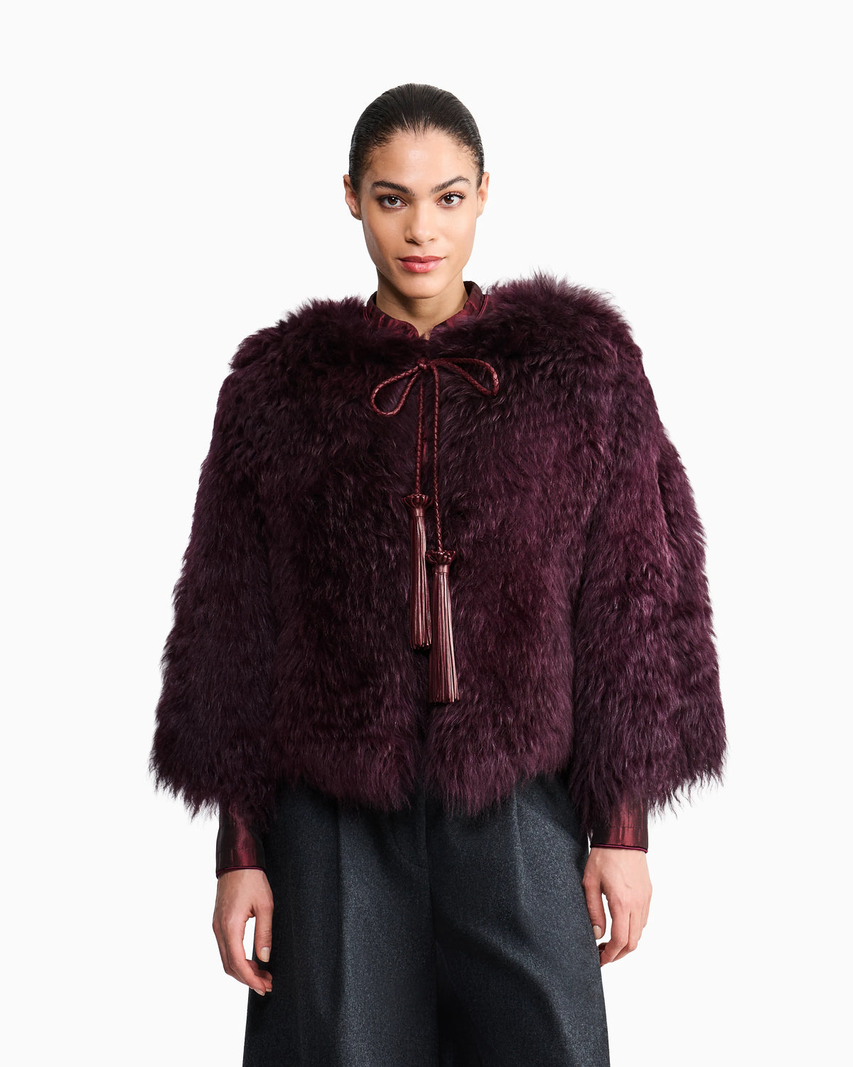 Long-haired leather jacket with tassels and silk lining