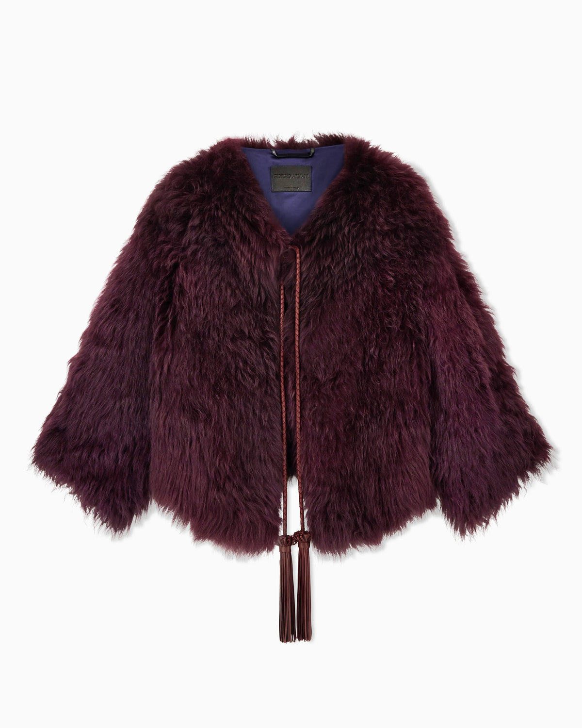 Long-haired leather jacket with tassels and silk lining