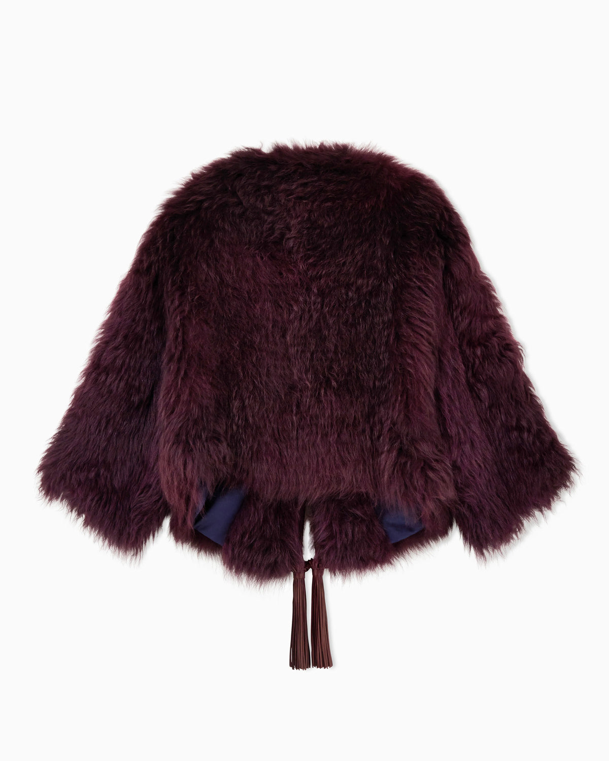 Long-haired leather jacket with tassels and silk lining
