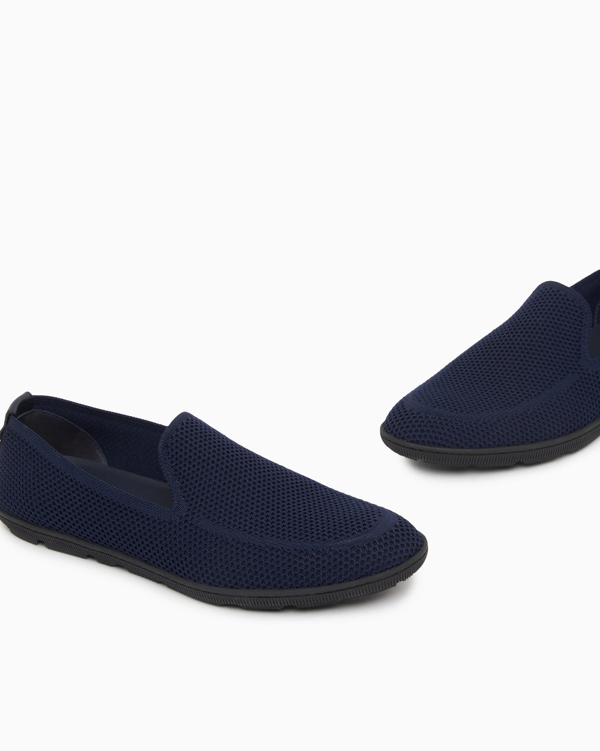 Breathable mesh slip-on sneaker with leather inserts