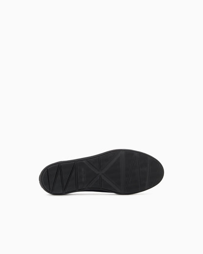 Breathable mesh slip-on sneaker with leather inserts