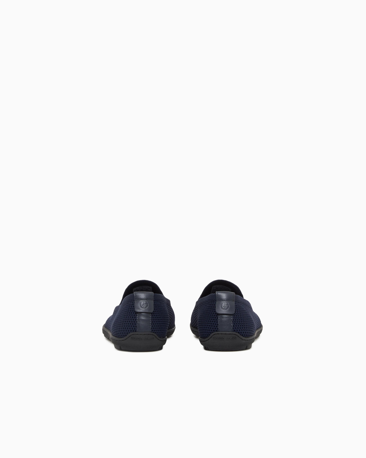 Breathable mesh slip-on sneaker with leather inserts