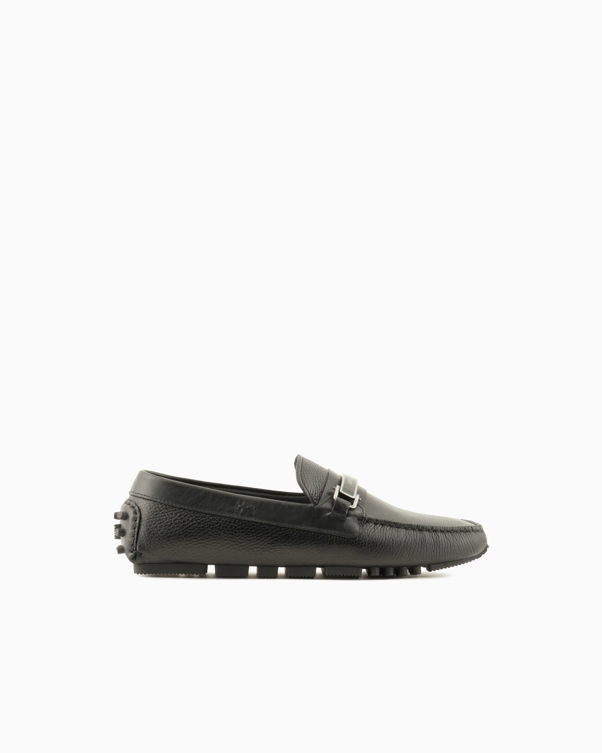 Stirrup bar loafer in pebbled leather with a studded sole