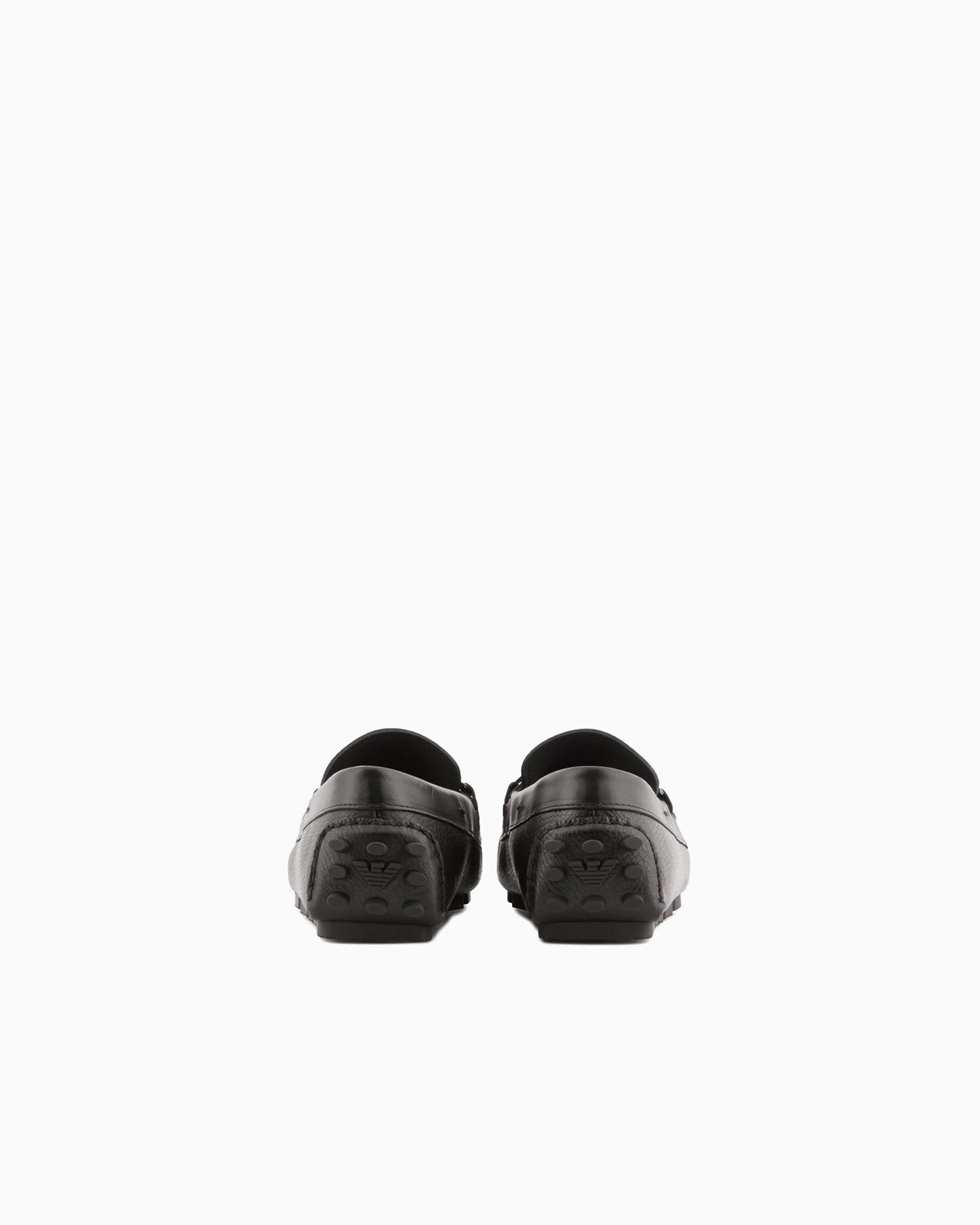 Stirrup bar loafer in pebbled leather with a studded sole