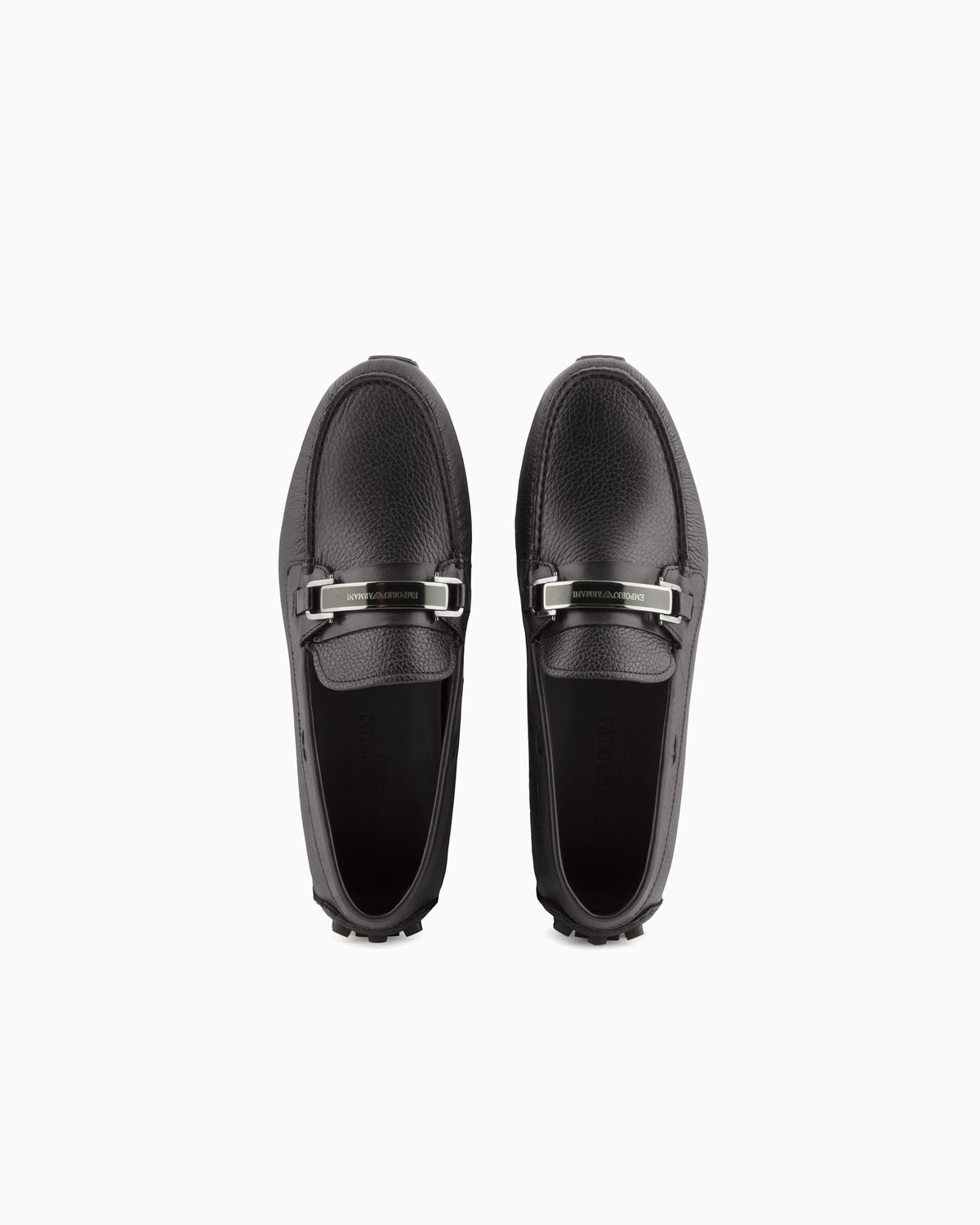 Stirrup bar loafer in pebbled leather with a studded sole