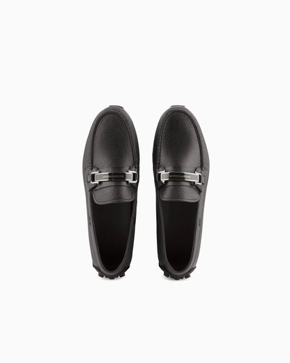 Stirrup bar loafer in pebbled leather with a studded sole