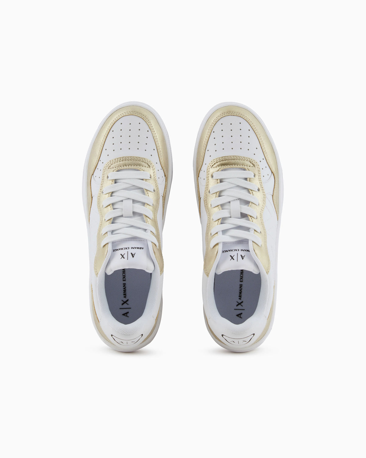 Sneakers with metallic inserts