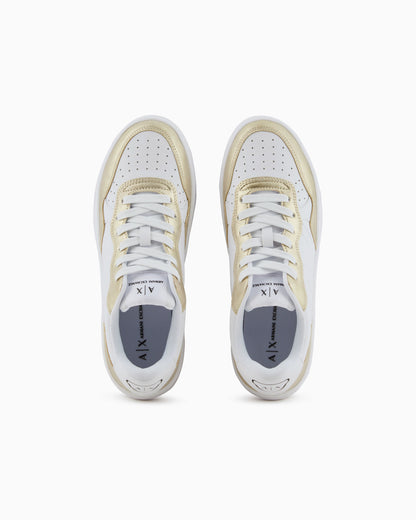 Sneakers with metallic inserts