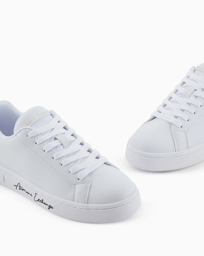 Sneakers with signature logo on the sole
