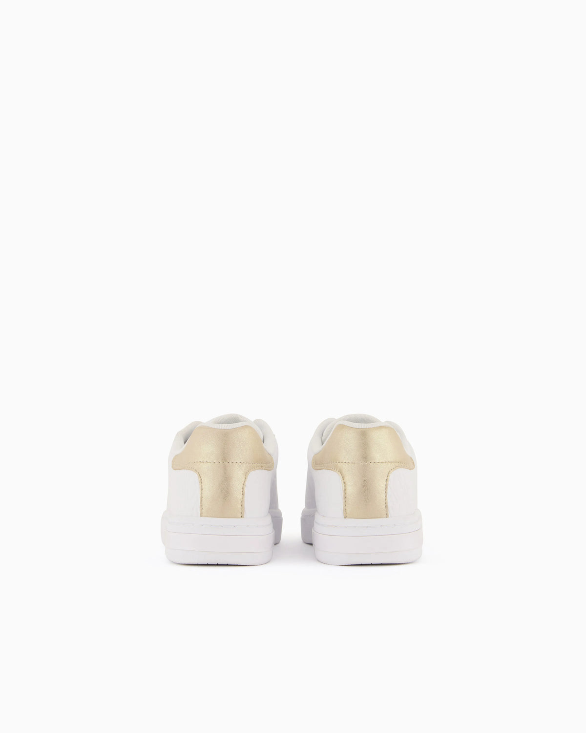 Low-top sneakers with embossed pattern and contrast heel