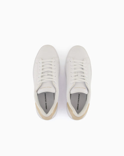 Low-top sneakers with embossed pattern and contrast heel